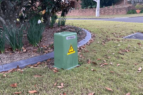 green electricity box outside house|green electrical box in street.